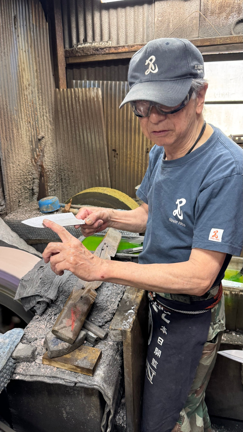 Knife Making Experience — the master finishing a blade